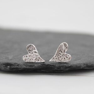 sterling silver tilted heart studs by lucy kemp jewellery