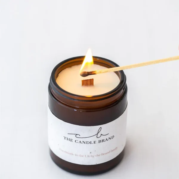 Dark honey & pepper 30hr candle by the candle brand
